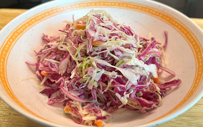 Sweet and Spicy Coleslaw with Honey and Jalepeno ready to serve.