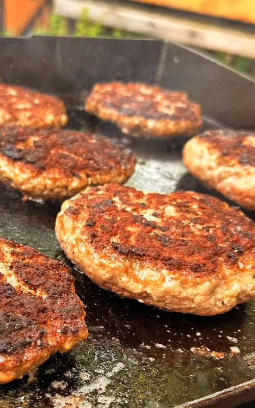 Burger Patties almost done being cooked.