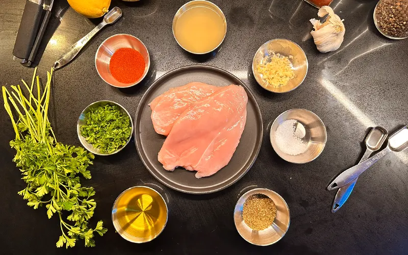 Preparing to marinade the chicken for the Mediterranean Rice Bowl Recipe.