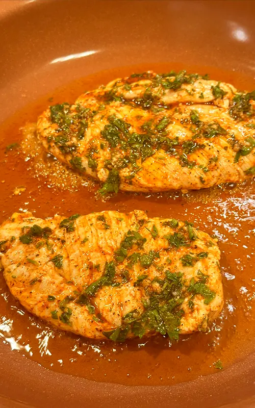 Cooking the marinated chicken to use in the Mediterranean Rice Bowl Recipe.